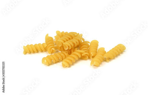 Multicolored Buckwheat spiral dry pasta isolated on white. Ancooked pasta noodles isolated on white background.