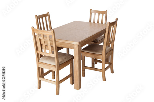 A set of kitchen furniture made of natural wood, a dining table and four chairs, isolated on the white background.