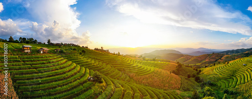 Fototapeta Naklejka Na Ścianę i Meble -  Panorama Aerial View sunlight at twilight of Pa Bong Piang terraced rice fields, Mae Chaem, Chiang Mai Thailand. Mountain hills valley at morning in asian, Vietnam. Nature landscape background.