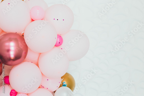 Beautiful multi-colored balloons with flowers for a party