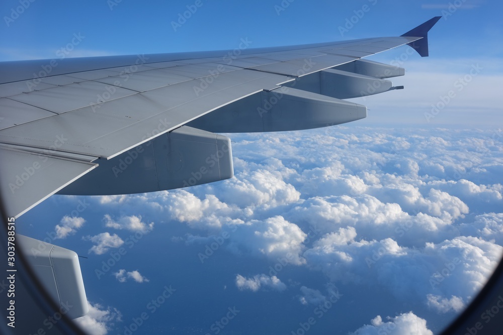 Fototapeta premium Beautiful sky view from an airplane, dramatic clouds.