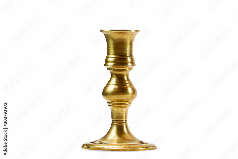 Old ancient vintage grunge brass candlestick isolated on white background with clipping path