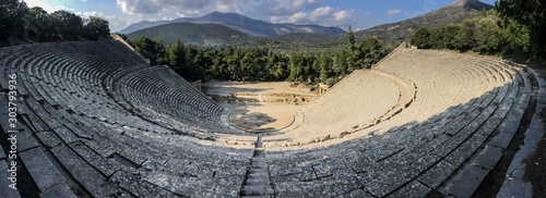 Wideangle panorama of famous ancient Epidauros amphitheater located in Greece near Lighourio photo