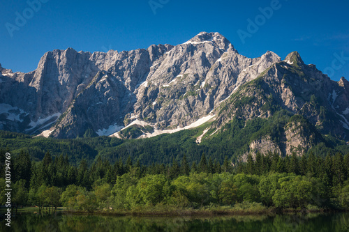 Spring landscape at Lake Fusine on the slopes of the Julian Alps, Tarvisio, Italy