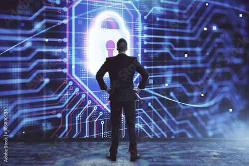 Businessman and lock icon hologram. Double exposure. Concept of data security