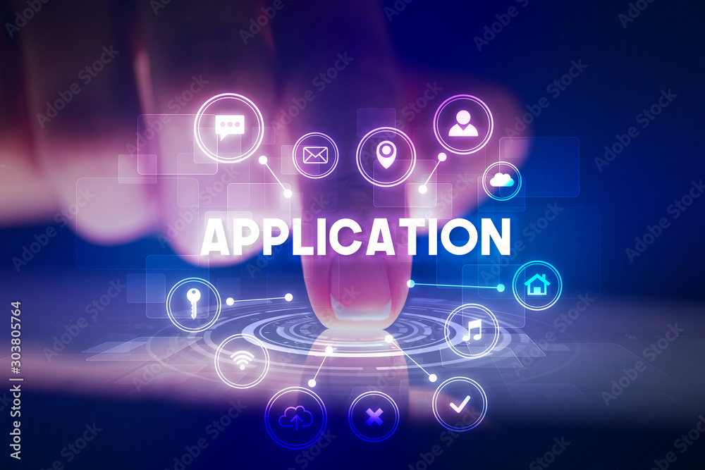 Finger touching tablet with web technology icons and APPLICATION inscription, web technology concept Finger touching tablet with web technology icons and APPLICATION inscription, web technology concept