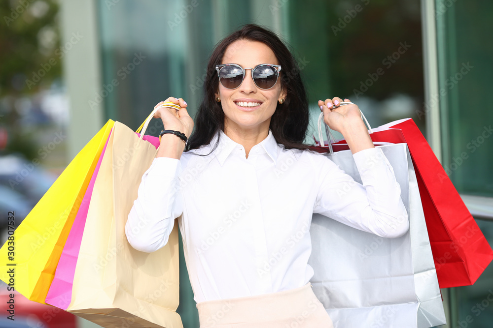 Portrait woman in sunglasses holding Portrait woman in sunglasses holding