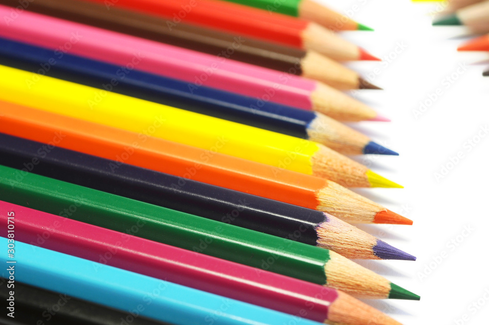 Color pencils isolated on white background. Close up. selective focus. Color pencils isolated on white background. Close up. selective focus.