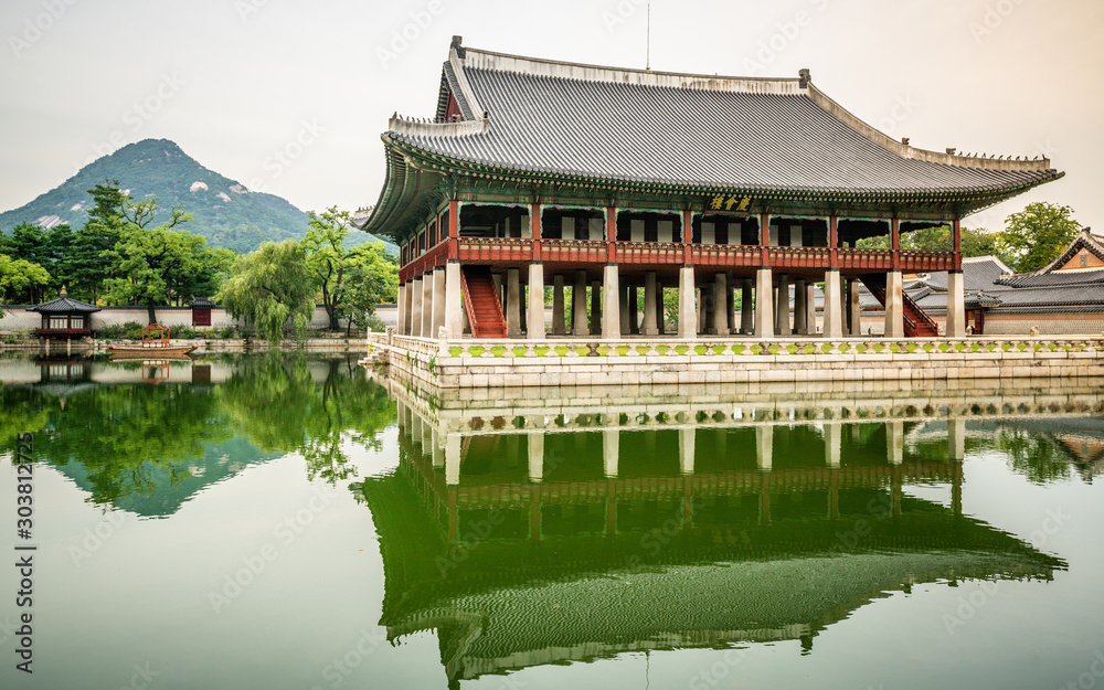Gyeonghoeru Pavilion and pond view at Gyeongbokgung palace in Seoul and mount Inwangsan in background Seoul South Korea