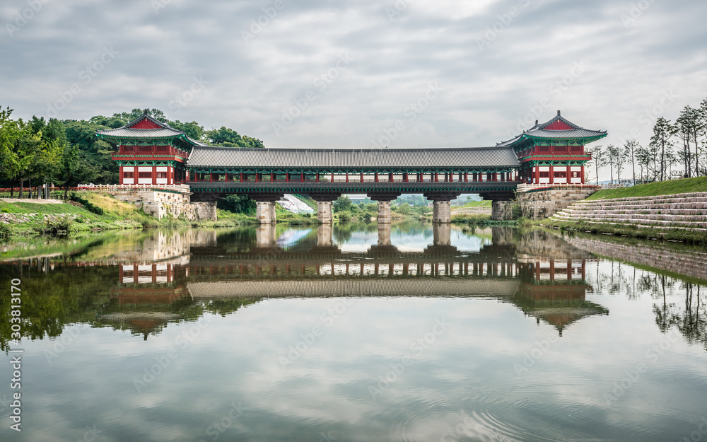 Woljeonggyo covered bridge scenic view and water reflection on cloudy day Gyeongju South Korea