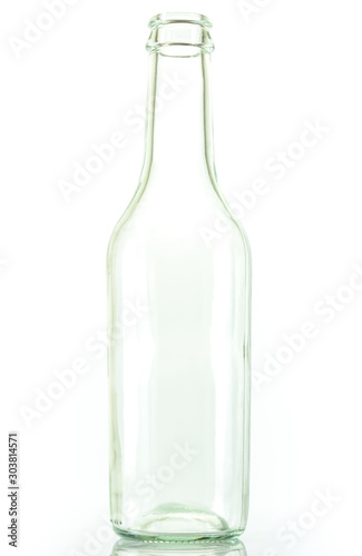 Empty colorless glass bottle, isolated.