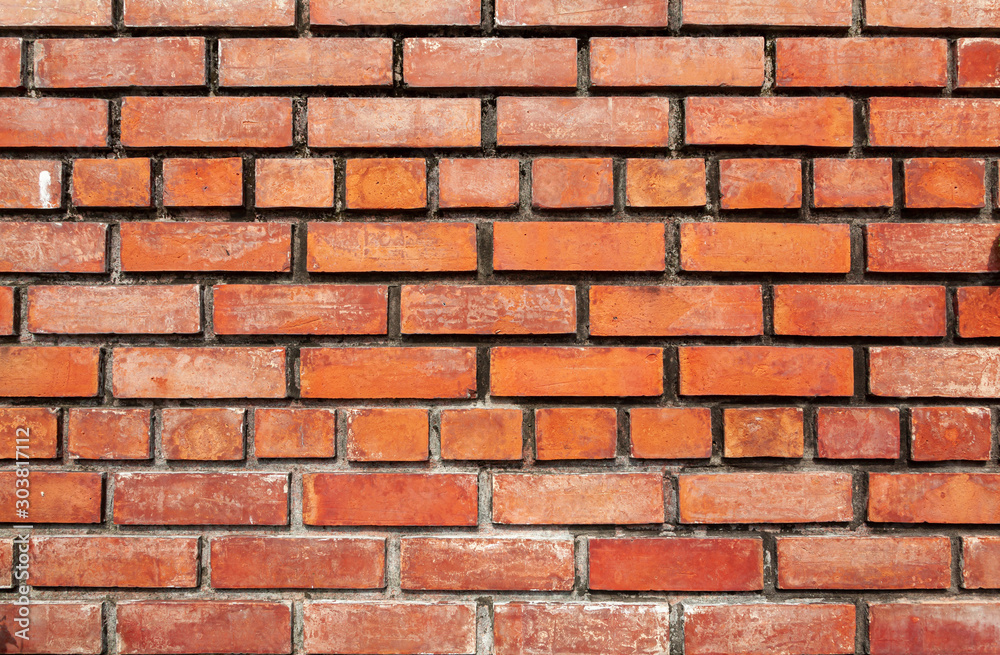 Old brick wall, old texture of red stone blocks closeup Old brick wall, old texture of red stone blocks closeup
