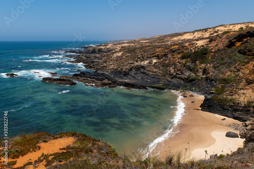 A small secluded beach near Almograve, at the Vicentine Coast, in Alentejo, Portugal. photo