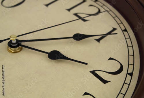 Time passing concept, old clock close up