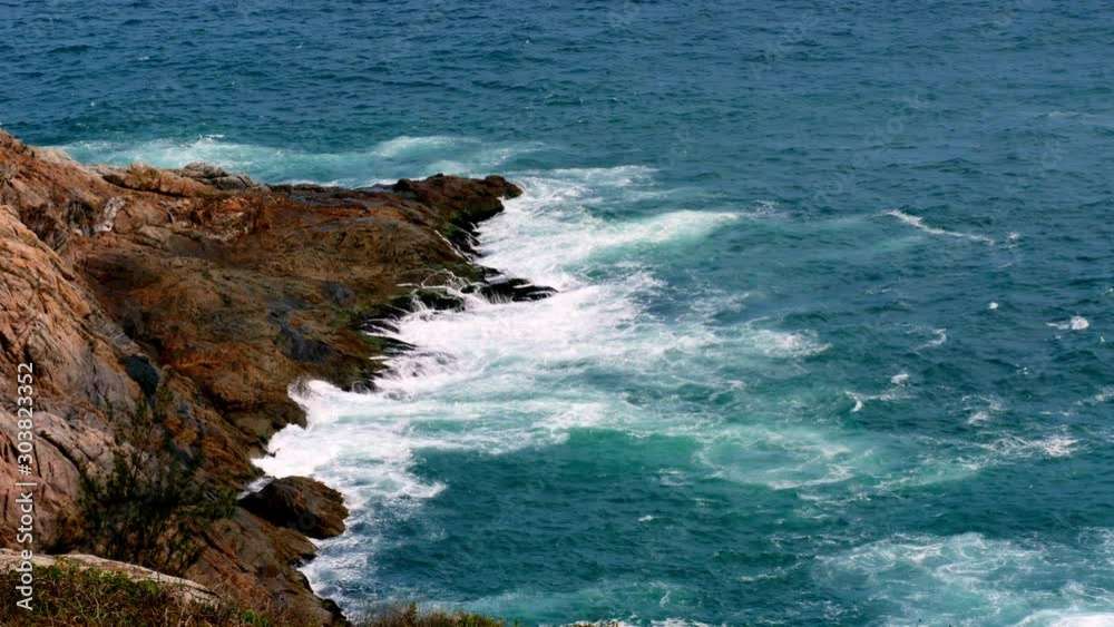 Powerful ocean waves smack into the rough terrain on the rocky coast in Brazil Powerful ocean waves smack into the rough terrain on the rocky coast in Brazil