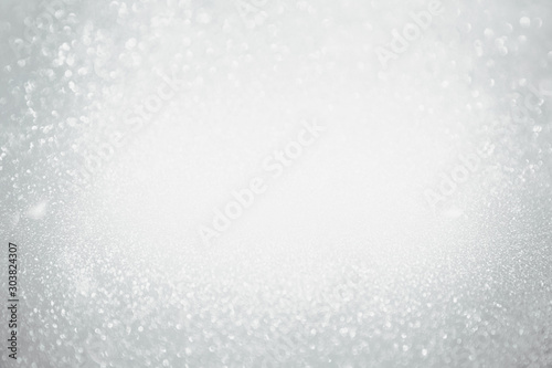 Abstract bokeh grey background. Christmas Glittering background.