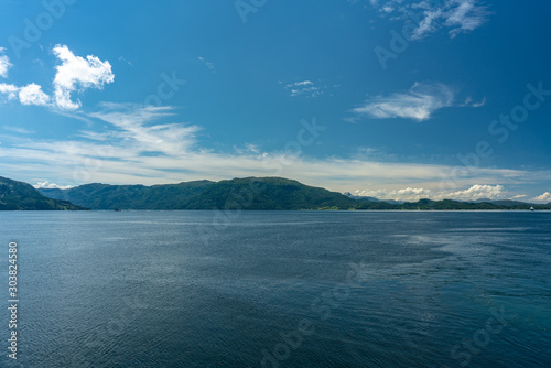 Fototapeta Naklejka Na Ścianę i Meble -  Beautiful view of a fjord or bay in Norway on a sunny summer day