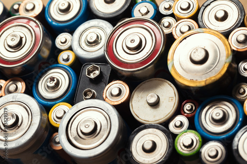 Canvastavla Used Alkaline batteries toxic waste recycling and ecology issues concept backgro