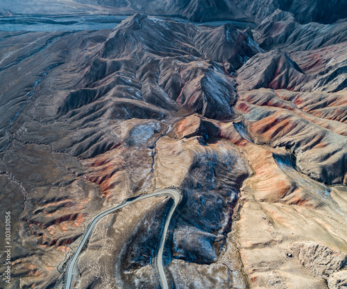 aerial view of the curved Qilian mountain road © Bob