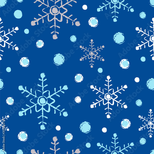 Seamless vector pattern with snowflakes and snowballs.
