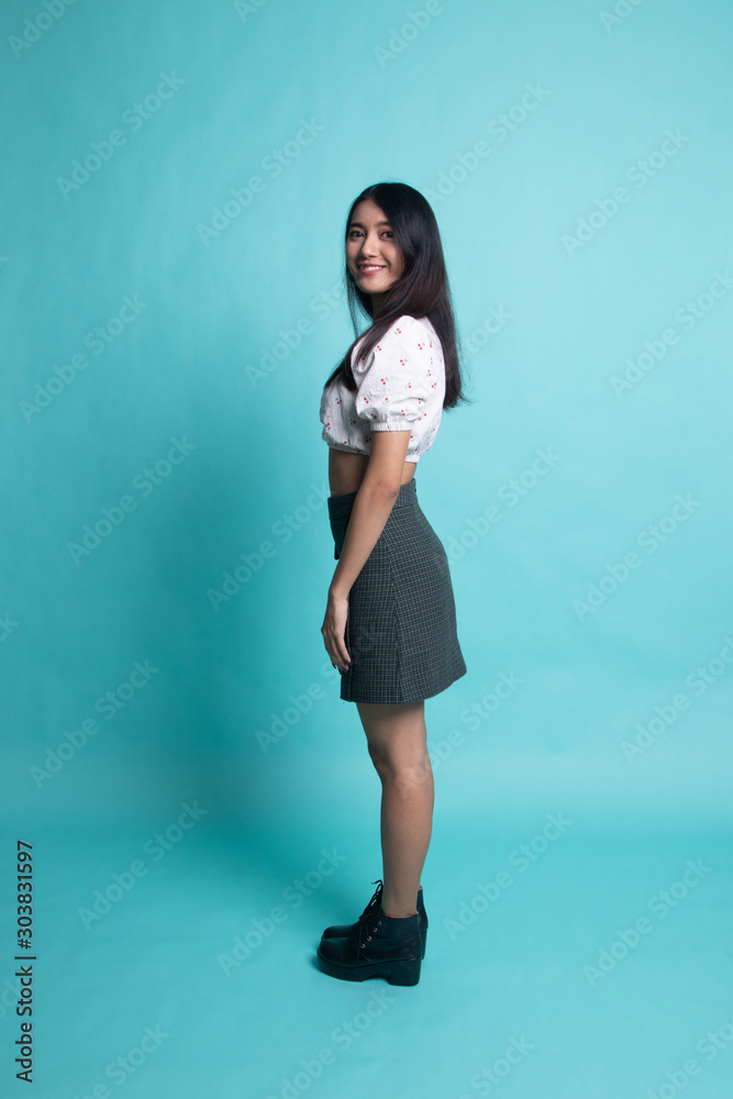 Full body side view of beautiful young asian woman. Full body side view of beautiful young asian woman.