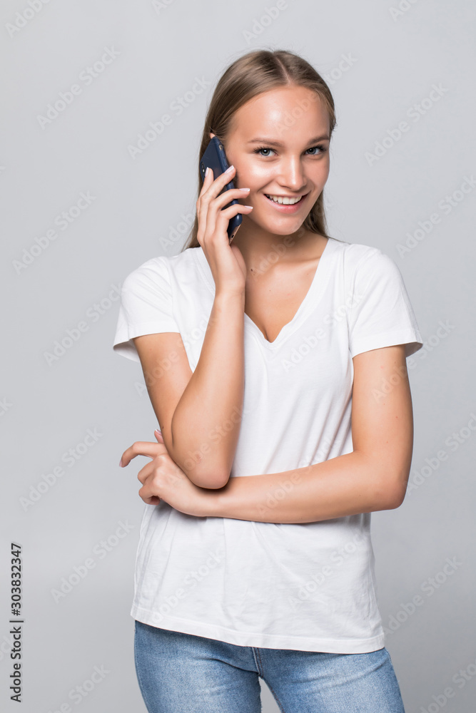 Young pretty woman talk phone isolated on white background Young pretty woman talk phone isolated on white background