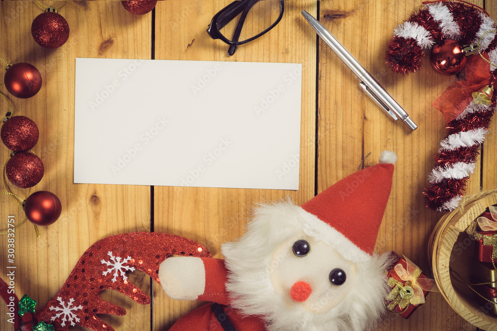 Fototapeta premium Christmas decoration frame on wooden background