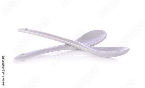 White ceramic spoon isolated on white background.