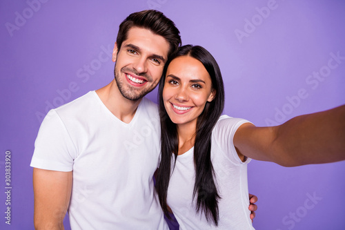Self-portrait of his he her she nice attractive charming lovely cute sweet cheerful cheery couple soulmate spending time hugging isolated on purple violet lilac color pastel background
