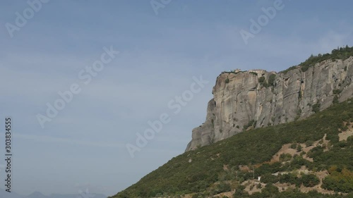 Natural rock formations with St. Stephen monastery on top 4K tilting video photo