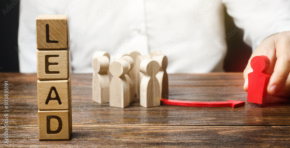 A businessman appoints a group of people a new leader. Appointment of a head to form a team. Project leadership. Distribution of duties. Career growth. Promotion to leading post. motivation. A businessman appoints a group of people a new leader. Appointment of a head to form a team. Project leadership. Distribution of duties. Career growth. Promotion to leading post. motivation.