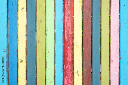 wooden fence. vintage colorful wooden background. Abstract colorful wood texture. Selective focus.