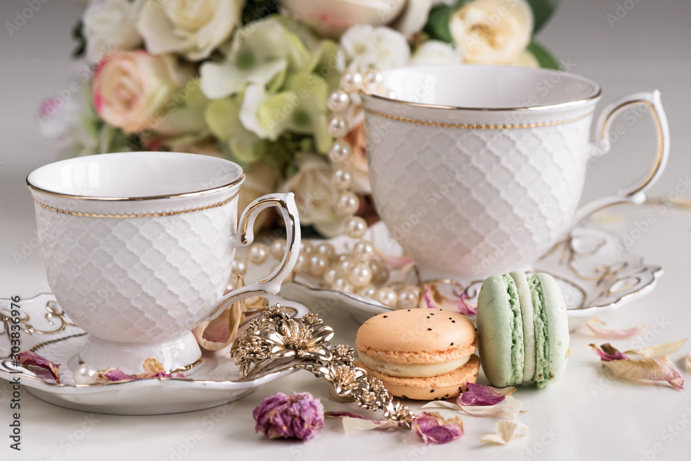 Fototapeta premium Christmas composition with flowers and white tea cups
