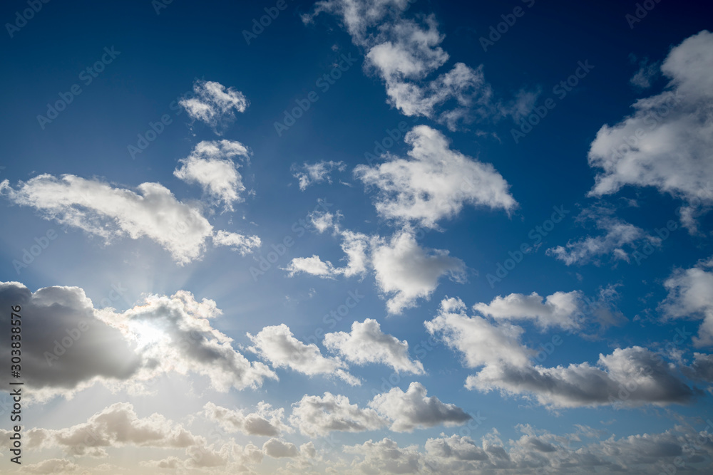 Fototapeta premium cloudscape with blue sky and sun for backgrounds