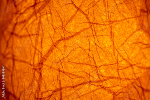 Abstract backlit orange background