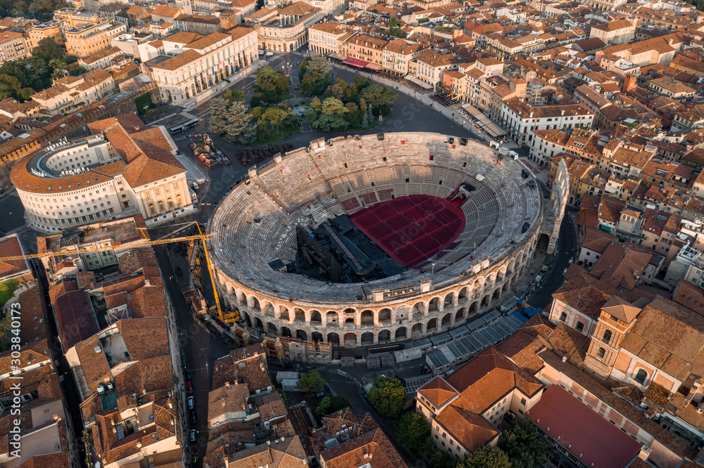 Fototapeta premium Aerial drone shot view of sunrise on ancient roman amphitheatre Verona Arena (Arena di Verona) in Verona, Italy