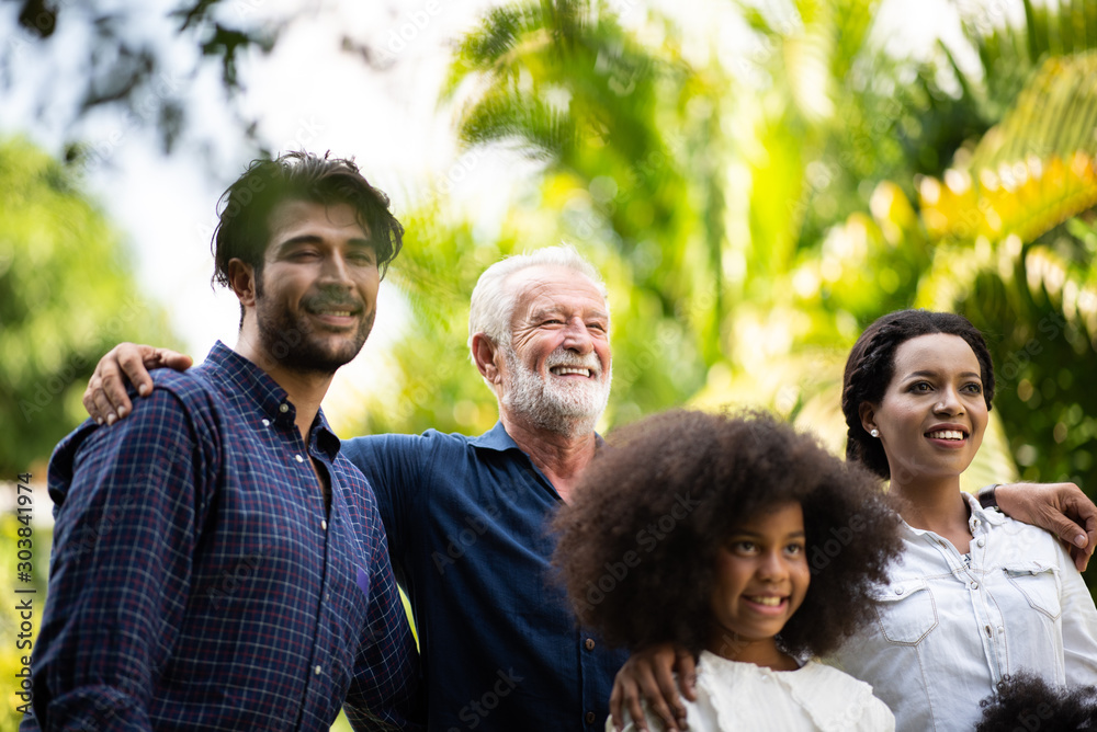 Happy people family concept laugh and have fun together with three different generations ages Happy people family concept laugh and have fun together with three different generations ages