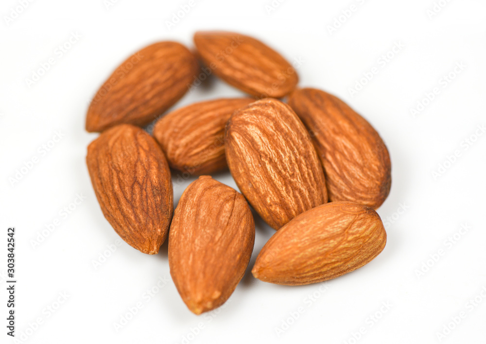 Almond isolated - Nuts on white background natural protein food and for snack , selective focus Almond isolated - Nuts on white background natural protein food and for snack , selective focus