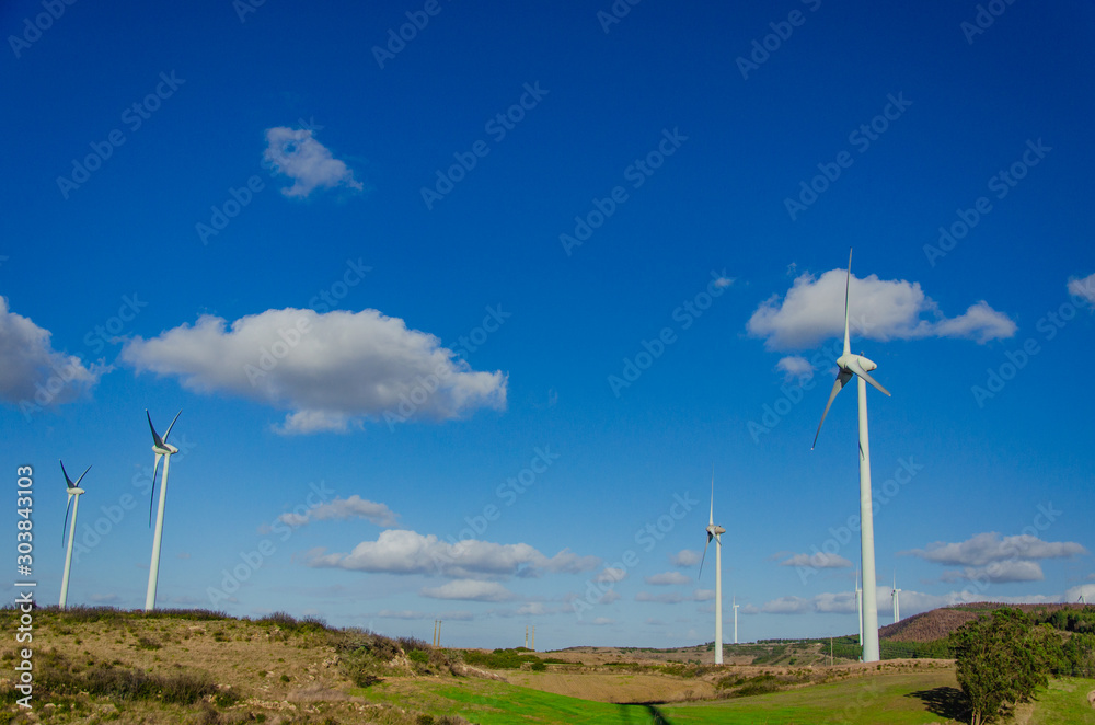 wind power plant. blue sky. Portugal. Arruda dos Vinhos. Green energy concept, eco power. Copy space. wind power plant. blue sky. Portugal. Arruda dos Vinhos. Green energy concept, eco power. Copy space.