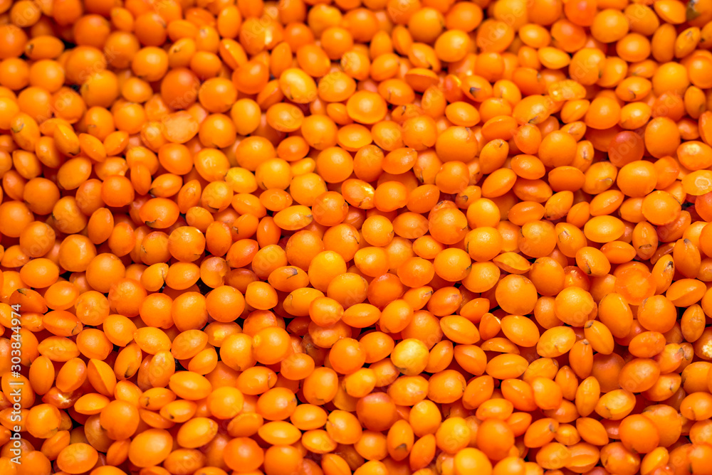 red lentils useful in a bowl on a dark background red lentils useful in a bowl on a dark background