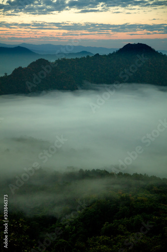mountains under mist in the morning