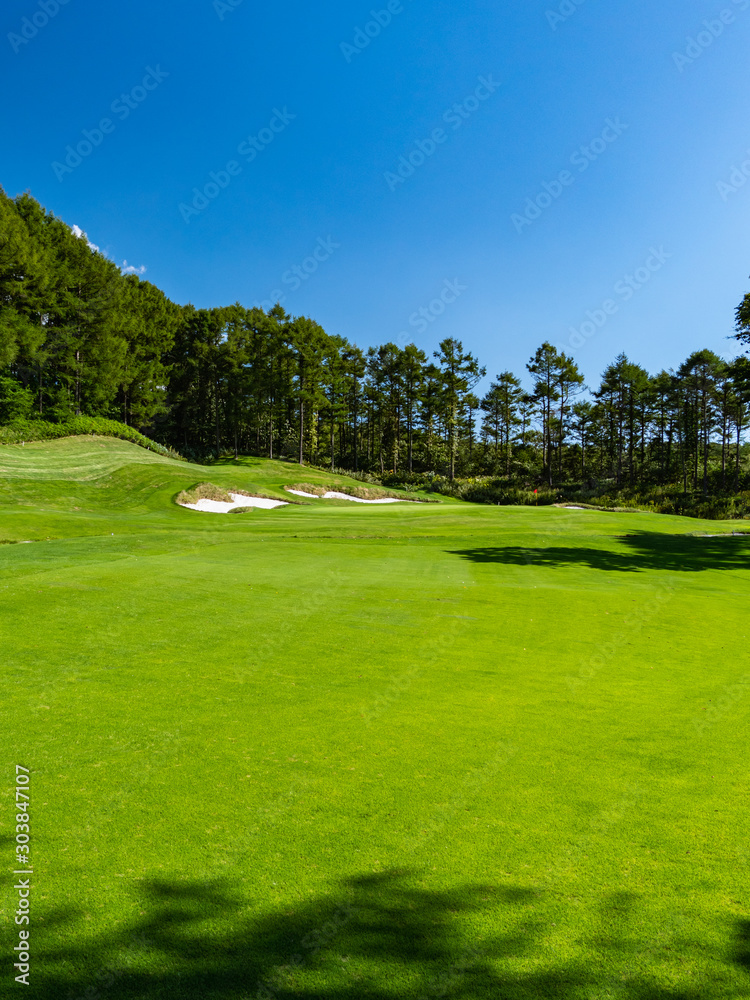 Golf Course with beautiful green field. Golf course with a rich green turf beautiful scenery.