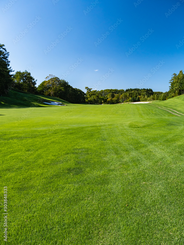 Golf Course with beautiful green field. Golf course with a rich green turf beautiful scenery.