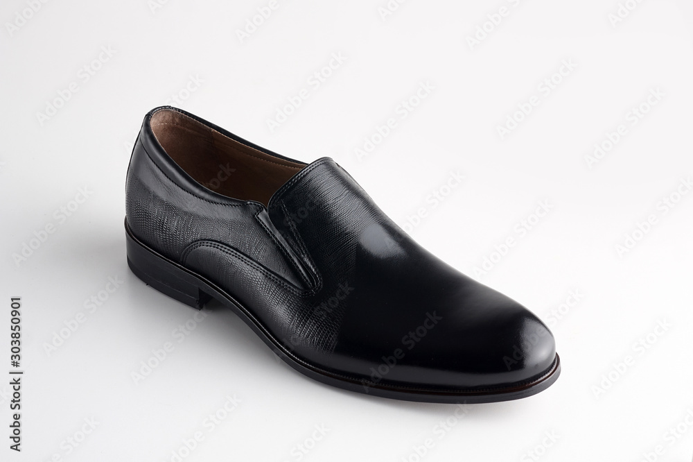 Men fashion black shoe loafer isolated on a white background. Men fashion black shoe loafer isolated on a white background.