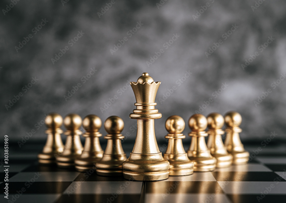 Gold Chess on chess board game for business metaphor leadership concept Gold Chess on chess board game for business metaphor leadership concept