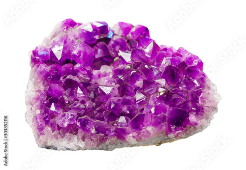 Violet Crystal Stone macro mineral. Purple rough Amethyst quartz crystals geode isolated on white. Amethyst gemstone Crystal Druse macro quartz mineral close up. Stone part of amethyst rock
