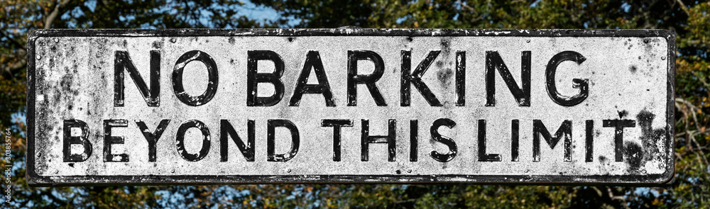 No Barking Beyond This Limit metal sign with aged patina No Barking Beyond This Limit metal sign with aged patina