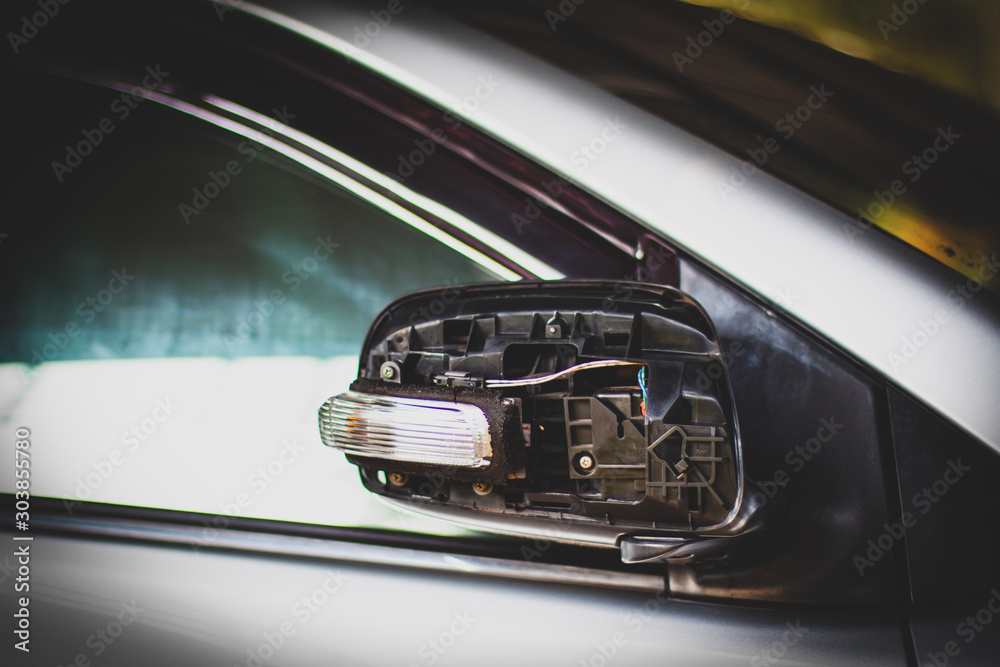 Naklejka premium The accident by transportation is cause to side mirror damaged.