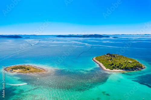 Beautiful blue paradise, small islands archipelago on Adriatic sea in Croatia, near Pakostane, drone aerial view © ilijaa