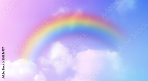 There are clouds and sky with rainbow as pastel background. © Ping198